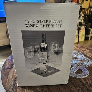 Brand new, vintage 12 piece, silver plated wine and cheese board set